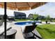 Relaxing backyard oasis featuring a stunning in-ground pool and lounge seating at 2245 Meadow Crk, Avon, IN 46123