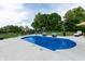 Gorgeous in-ground pool surrounded by lush landscaping, offering a serene retreat at 2245 Meadow Crk, Avon, IN 46123