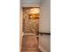 Stairwell to basement with stacked stone accent wall at 2245 Meadow Crk, Avon, IN 46123