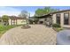 Expansive backyard featuring a fire pit, shed, and various seating areas for outdoor enjoyment at 2303 Alexandria Dr, Greenfield, IN 46140