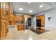 Modern kitchen featuring granite counters, stainless steel appliances, and recessed lighting at 2303 Alexandria Dr, Greenfield, IN 46140