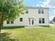Spacious backyard with a patio, and exterior views of the home at 2444 Cole Branch Ct, Indianapolis, IN 46239