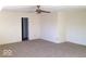 Spacious bedroom with neutral carpeting, ceiling fan and open doorway for easy access at 2931 Sentiment Ln, Greenwood, IN 46143
