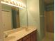 Bathroom features a double sink vanity and shower-tub combination at 2996 Colony Lake W Dr, Plainfield, IN 46168