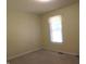 Bedroom with a window providing natural light and neutral-toned walls at 2996 Colony Lake W Dr, Plainfield, IN 46168