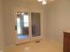 Bright dining area features sliding glass doors to a patio area at 2996 Colony Lake W Dr, Plainfield, IN 46168