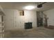 The garage has a wall of storage cabinets and an overhead door at 2996 Colony Lake W Dr, Plainfield, IN 46168