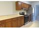 Updated kitchen featuring modern appliances, ample countertop space, and beautiful wood cabinetry at 2996 Colony Lake W Dr, Plainfield, IN 46168