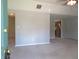 Bright living room with neutral paint, plush carpet and multiple entryways at 2996 Colony Lake W Dr, Plainfield, IN 46168