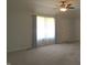 Bright living room with a ceiling fan and a large window that allows for natural light at 2996 Colony Lake W Dr, Plainfield, IN 46168