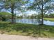 Beautiful community pond featuring a fountain and lush green surroundings for scenic views at 2996 Colony Lake W Dr, Plainfield, IN 46168