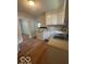 A kitchen featuring white cabinets and an oven at 3026 S Rybolt Ave, Indianapolis, IN 46241