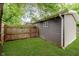 Backyard featuring lush grass and a privacy fence at 3149 Thayer St, Indianapolis, IN 46222