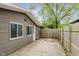 Fenced backyard featuring a concrete patio area and low-maintenance landscaping at 3149 Thayer St, Indianapolis, IN 46222