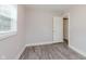 Bedroom featuring lots of natural light and wood-look flooring at 3149 Thayer St, Indianapolis, IN 46222