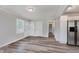 Bright living room with fresh paint, hardwood floors, and ample natural light at 3149 Thayer St, Indianapolis, IN 46222