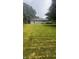 Large grassy backyard with privacy fence at 336 Brookside Ln, Plainfield, IN 46168