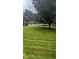 Spacious backyard features mature tree and privacy fence at 336 Brookside Ln, Plainfield, IN 46168