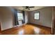 A light and airy bedroom with two windows and hardwood flooring at 336 Brookside Ln, Plainfield, IN 46168