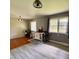 Inviting dining area with an island and natural light from large windows at 336 Brookside Ln, Plainfield, IN 46168