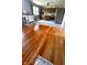 Charming kitchen features wood cabinets, stainless steel appliances, and new floors at 336 Brookside Ln, Plainfield, IN 46168