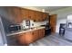 Well-equipped kitchen with stainless steel appliances and wood cabinets at 336 Brookside Ln, Plainfield, IN 46168