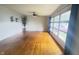Spacious living room with hardwood floors, lots of windows, and neutral paint at 336 Brookside Ln, Plainfield, IN 46168