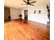 Spacious living room with hardwood floors, lots of windows, and neutral paint at 336 Brookside Ln, Plainfield, IN 46168