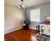Living room with hardwood floors, gray walls, and plenty of natural light at 336 Brookside Ln, Plainfield, IN 46168