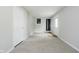 Empty bedroom with neutral walls, carpeted flooring, and a closet at 3538 N Elizabeth St, Indianapolis, IN 46226