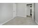 Empty bedroom with neutral walls, carpeted flooring, and a closet at 3538 N Elizabeth St, Indianapolis, IN 46226