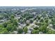 A lush neighborhood filled with trees, cozy homes, and winding streets at 4129 Cornelius Ave, Indianapolis, IN 46208