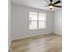 Bright bedroom with modern ceiling fan and natural light from a window at 4129 Cornelius Ave, Indianapolis, IN 46208