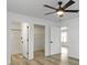Bedroom with doors to bathroom, closet, and another room at 4129 Cornelius Ave, Indianapolis, IN 46208