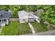 Charming single-story home with a well-manicured lawn and inviting front porch at 4129 Cornelius Ave, Indianapolis, IN 46208