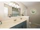 Bathroom vanity featuring a round window and granite countertops at 431 N Bauman St, Indianapolis, IN 46214