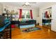 bedroom with bunkbeds, hardwood floors, and a mirrored closet for added storage at 431 N Bauman St, Indianapolis, IN 46214