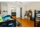 bedroom with bunkbeds, hardwood floors, and a mirrored closet for added storage at 431 N Bauman St, Indianapolis, IN 46214
