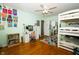 Bedroom with wood floors, bunkbeds, and ample space for play and study at 431 N Bauman St, Indianapolis, IN 46214
