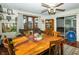 Open concept dining room with hardwood floors and a large table at 431 N Bauman St, Indianapolis, IN 46214