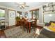 Cozy dining room with beautiful wood floors and plenty of natural light at 431 N Bauman St, Indianapolis, IN 46214