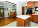 Kitchen featuring a center island and a view into the dining room at 431 N Bauman St, Indianapolis, IN 46214