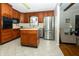 Updated kitchen features stainless steel appliances and a center island at 431 N Bauman St, Indianapolis, IN 46214