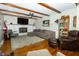 Cozy living room with a fireplace, hardwood floors, and comfortable seating at 431 N Bauman St, Indianapolis, IN 46214