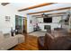 Bright living room features hardwood floors, a cozy fireplace, and comfortable seating at 431 N Bauman St, Indianapolis, IN 46214