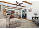 The living room features hardwood floors, beams, fireplace and comfortable sectional sofa at 431 N Bauman St, Indianapolis, IN 46214