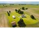 Picturesque aerial view of a charming home nestled on a manicured lawn surrounded by farmland at 4330 S 100 E, Lebanon, IN 46052