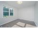 Bright bedroom featuring plush carpeting and a window with views of the outdoors at 4330 S 100 E, Lebanon, IN 46052
