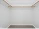 Organized walk-in closet with ample hanging space and neutral carpeting at 4330 S 100 E, Lebanon, IN 46052