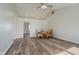 Bright dining room featuring wood floors, vaulted ceilings, and stylish chandelier at 4330 S 100 E, Lebanon, IN 46052